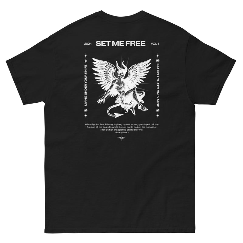 Black tee with 'Set Me Free' text on the back next to a devil angel mix graphic
